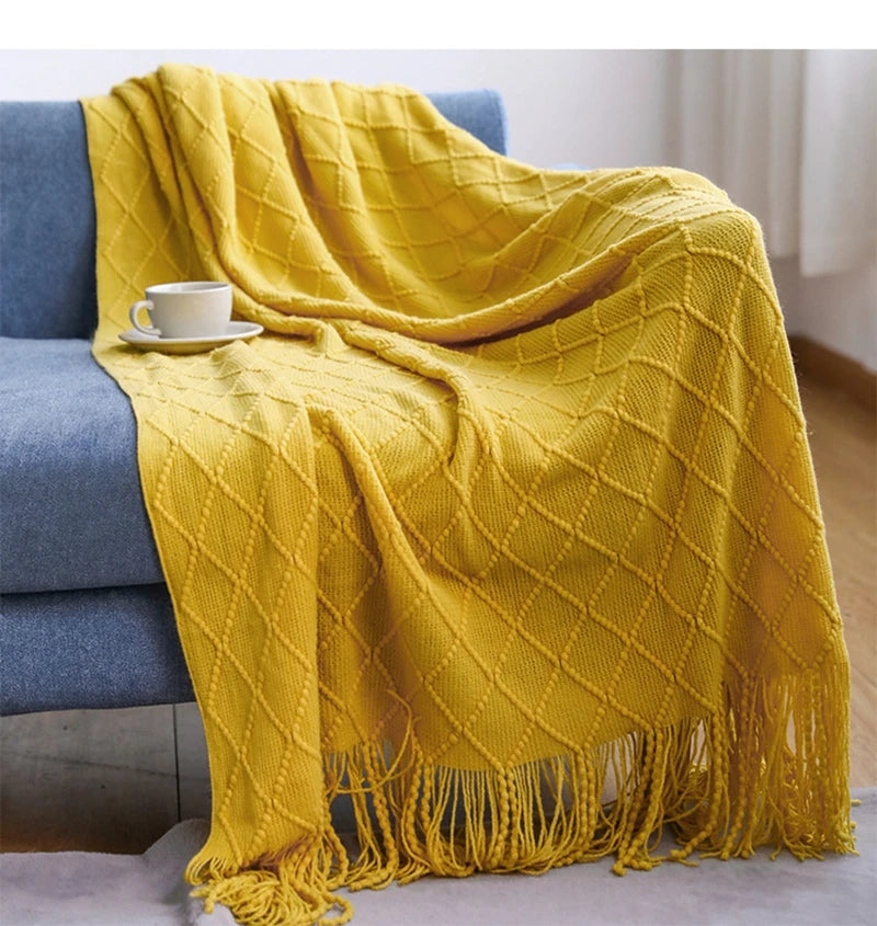 Plaid tricoté oversized à pompons — Chaleur boho & cocooning visuel