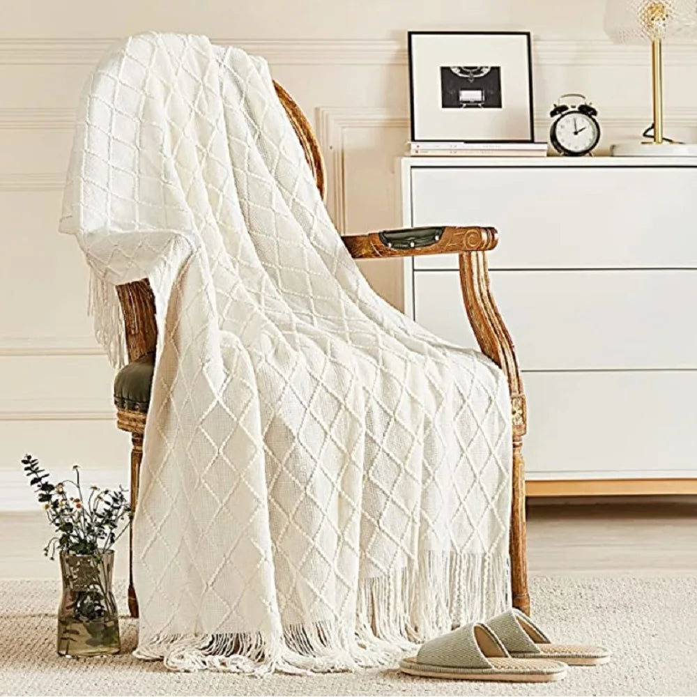 Plaid tricoté oversized à pompons — Chaleur boho & cocooning visuel