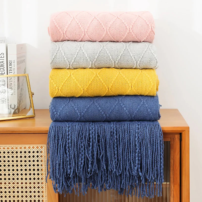 Plaid tricoté oversized à pompons — Chaleur boho & cocooning visuel
