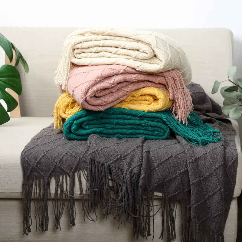 Plaid tricoté oversized à pompons — Chaleur boho & cocooning visuel